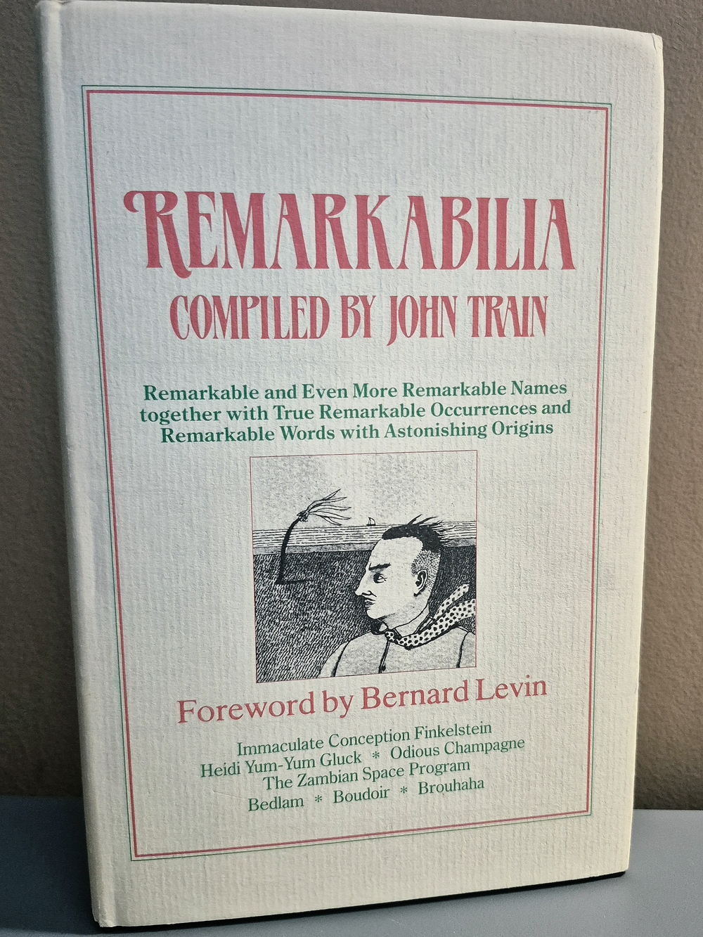 Remarkabilia compiled by John Train — Cream & Pink Hardcover Book